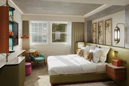 Habitación King Deluxe con vistas a la ciudad del hotel Corus Hyde Park. Foto 4