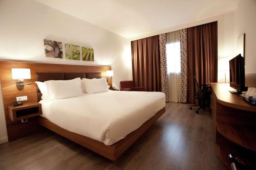 Habitación con cama extragrande - Adaptada para personas de movilidad reducida del hotel Hilton Garden Inn Malaga