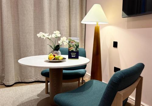 Double Family Room with Single Bed del hotel Doubletree By Hilton London Marble Arch. Foto 4
