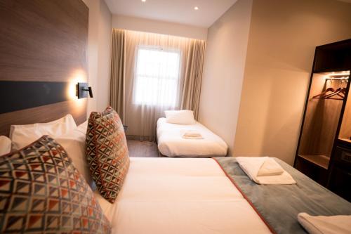 Habitación Triple del hotel Oxford Earl's Court