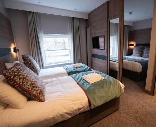 Habitación cuádruple del hotel Oxford Earl's Court. Foto 2
