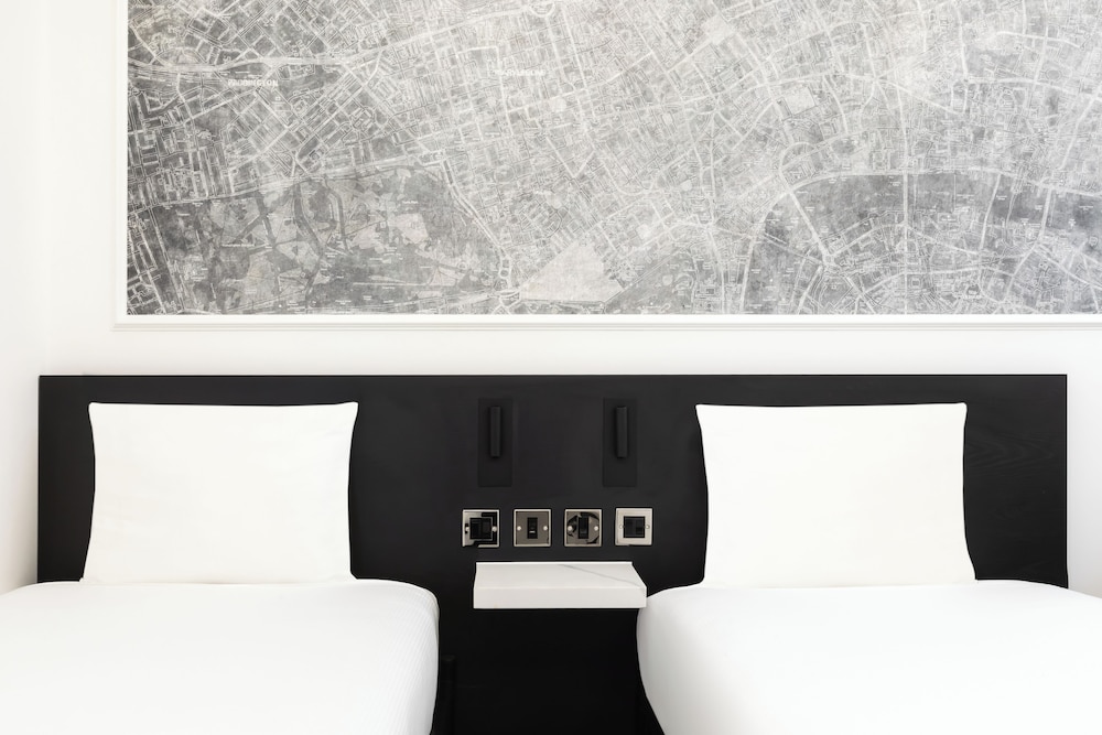 Habitación Signature con 2 camas individuales del hotel St Giles - London. Foto 1