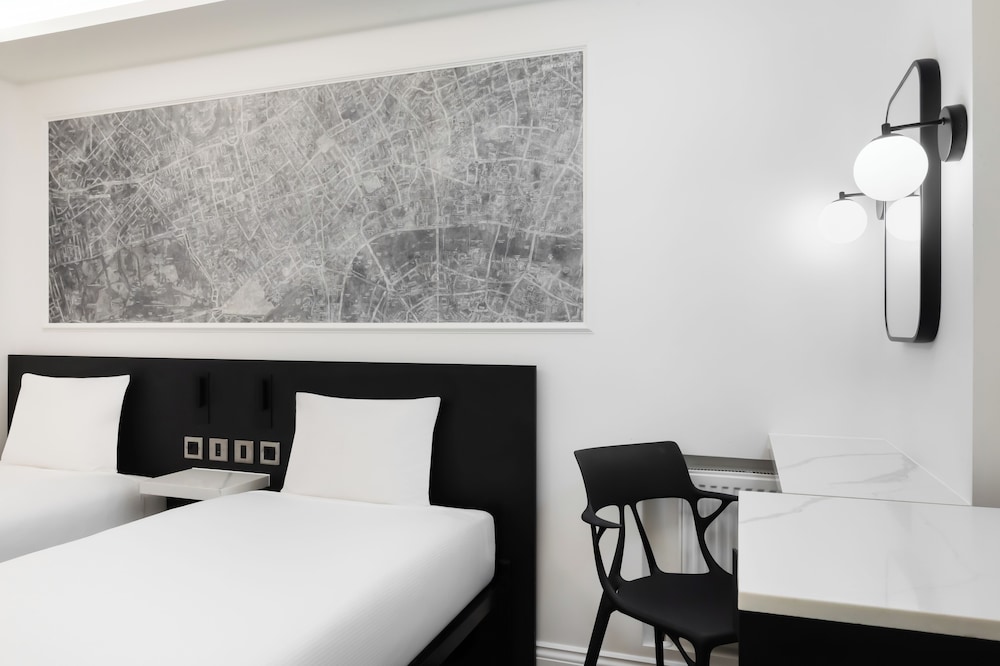 Habitación Signature con 2 camas individuales del hotel St Giles - London. Foto 2