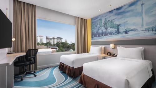 Habitación Doble Superior - 2 camas del hotel Mercure Jakarta Cikini. Foto 4