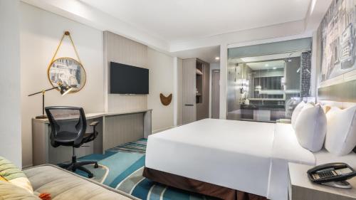 Habitación Deluxe del hotel Mercure Jakarta Cikini. Foto 6