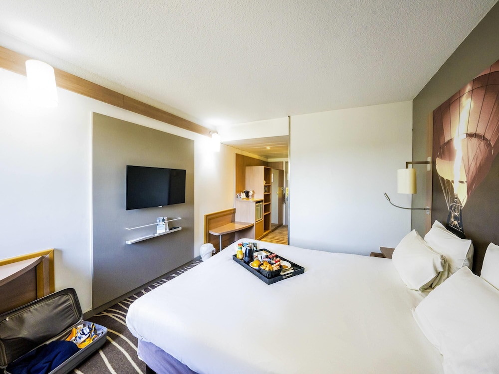 Habitación Classic - Una cama doble y un sofá cama para un niño del hotel Mercure Vienne Sud Chanas
