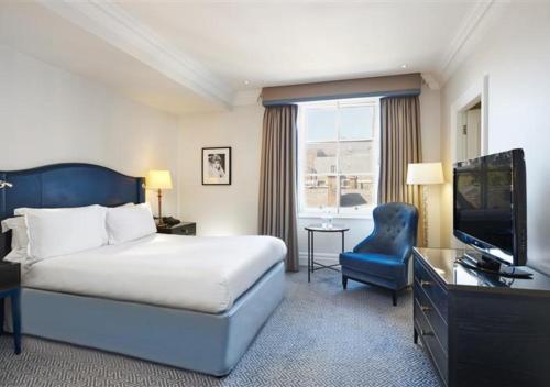 Habitación Deluxe Queen del hotel The Waldorf Hilton, London. Foto 1