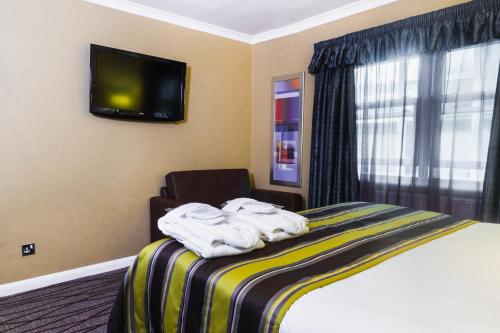 Habitación Doble Deluxe del hotel Park Grand Hyde Park. Foto 3