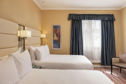 Habitación cuádruple del hotel Park Grand Hyde Park