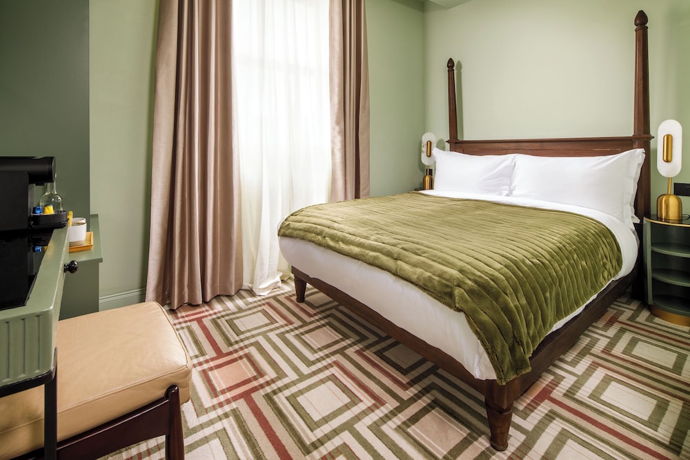 Habitación Deluxe del hotel Ellen Kensington. Foto 1