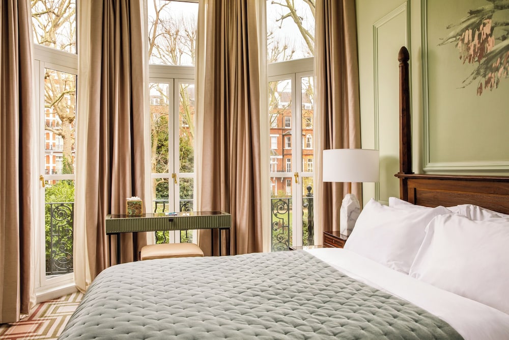 Suite Lujo 1 Cama queen del hotel Ellen Kensington. Foto 2