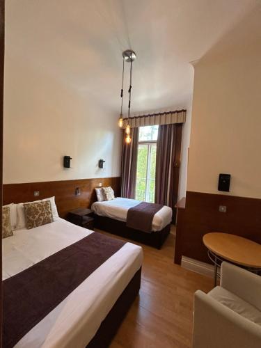 Habitación Triple del hotel Garden View. Foto 8