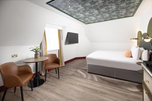 Habitación Premium con vistas a la calle - 1 cama grande del hotel The Welbeck. Foto 3