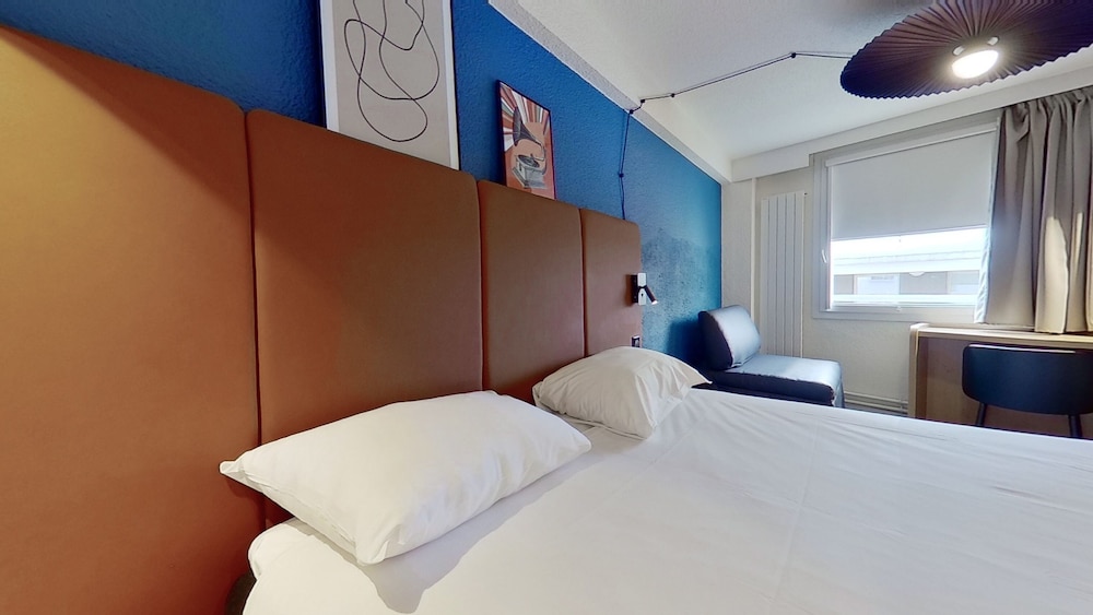 Habitación triple, 1 cama doble con sofá cama del hotel IBIS PARIS BRANCION PARC DES EXPOSITIONS 15ÈME. Foto 1