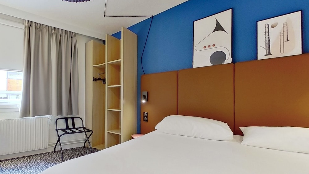 Habitación triple, 1 cama doble con sofá cama del hotel IBIS PARIS BRANCION PARC DES EXPOSITIONS 15ÈME. Foto 2