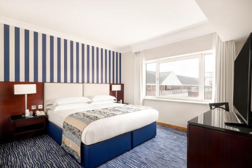 Suite Chelsea con cama grande del hotel The Chelsea Harbour and Spa. Foto 9