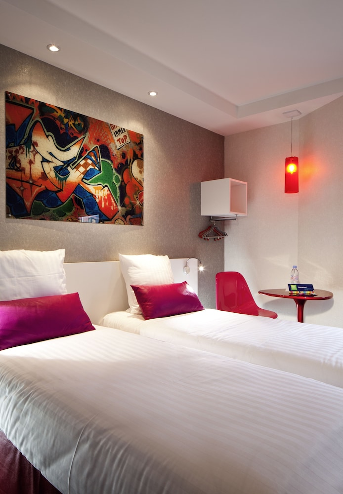 Habitación estándar con camas individuales del hotel Ibis Styles Blois Centre Gare. Foto 1