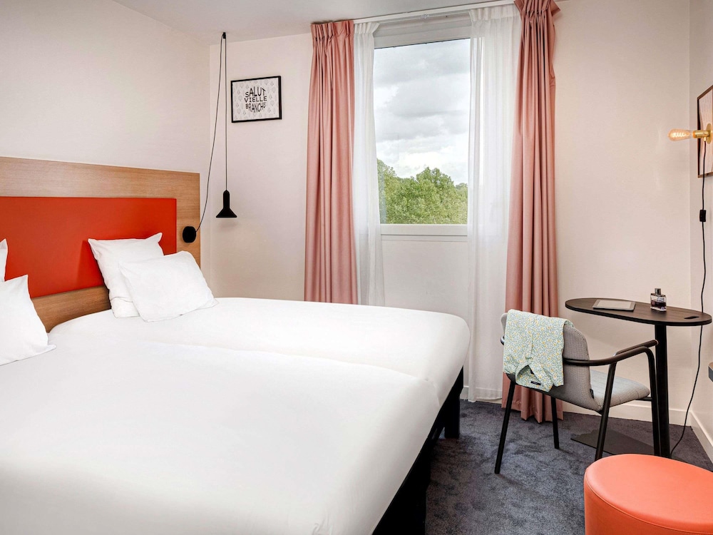 Habitación estándar con 2 camas individuales del hotel Ibis Styles Montargis Arboria. Foto 5