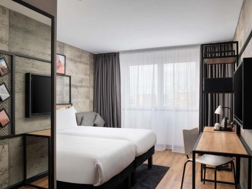 Habitación Triple Superior con sofá cama - 2 camas individuales del hotel Ibis London Earls Court