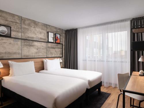 Recién reformada - Habitación Doble Estándar - 2 camas individuales del hotel Ibis London Earls Court. Foto 3