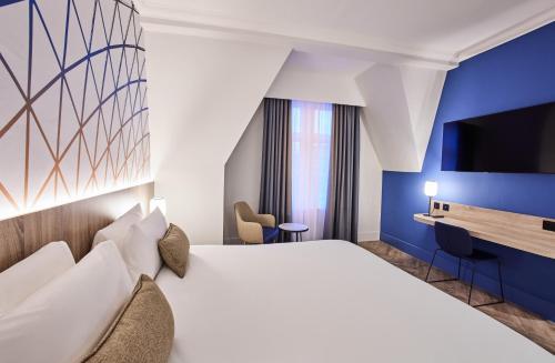 Habitación Deluxe con cama extragrande del hotel Thistle Bloomsbury Park. Foto 3