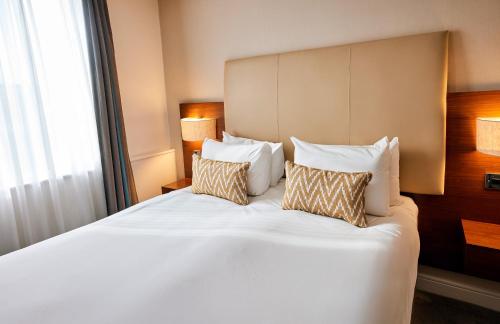 Habitación Doble Estándar del hotel Thistle London Piccadilly. Foto 3