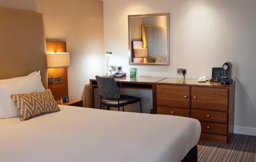 Habitación Deluxe con cama extragrande del hotel Thistle London Piccadilly