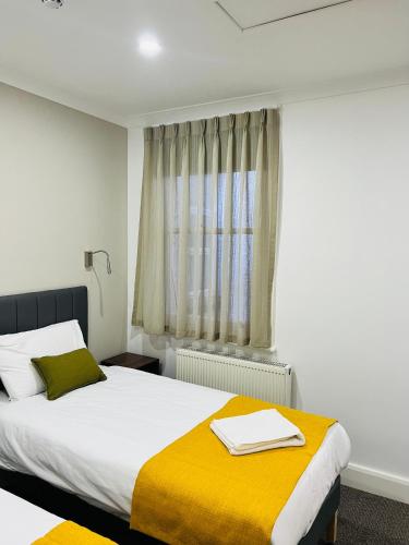 Habitación Doble - 2 camas del hotel Park Avenue Bayswater Inn Hyde Park. Foto 4