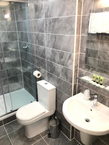 Habitación - 4 camas del hotel Park Avenue Bayswater Inn Hyde Park. Foto 3