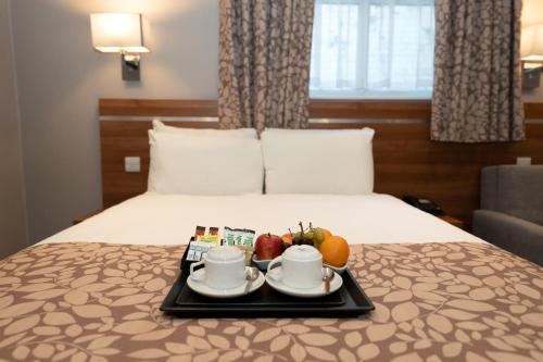 Suite Junior del hotel Park Avenue Bayswater Inn Hyde Park. Foto 3