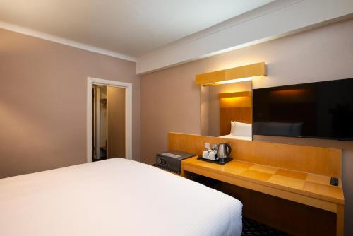 Habitación con cama extragrande. del hotel Tavistock. Foto 3