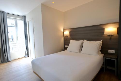 Habitación Doble del hotel Hipotel Paris Voltaire Bastille. Foto 8