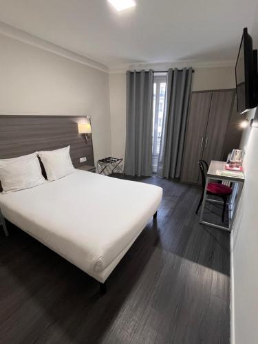 Habitación Doble del hotel Hipotel Paris Voltaire Bastille. Foto 13