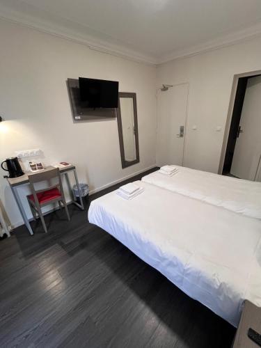 Habitación Doble - 2 camas del hotel Hipotel Paris Voltaire Bastille. Foto 4