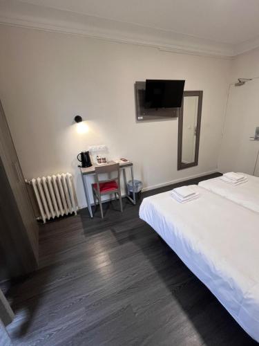 Habitación Doble - 2 camas del hotel Hipotel Paris Voltaire Bastille. Foto 7