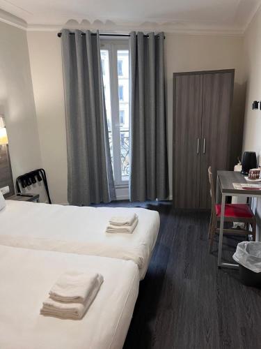 Habitación Doble - 2 camas del hotel Hipotel Paris Voltaire Bastille. Foto 13