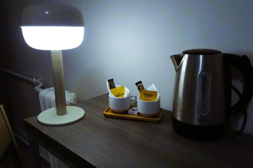 Habitación Triple del hotel Hipotel Paris Voltaire Bastille. Foto 7
