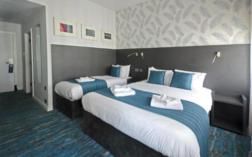 Habitación Triple del hotel K Kensington. Foto 2