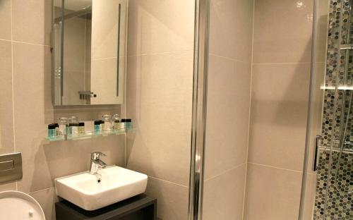 Habitación Triple del hotel K Kensington. Foto 6