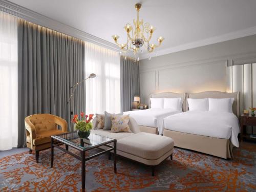 Habitación doble de lujo con 2 camas dobles del hotel The Savoy