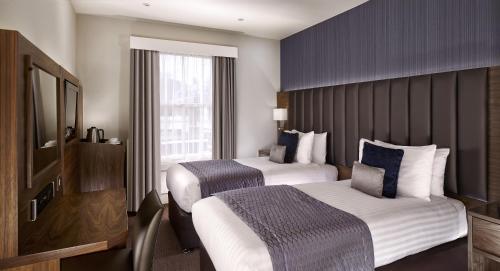 Habitación Doble Club - 2 camas del hotel Norfolk Towers Paddington. Foto 1