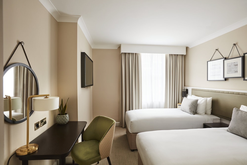 Habitación clásica con 2 camas individuales del hotel The Clermont London, Victoria. Foto 1