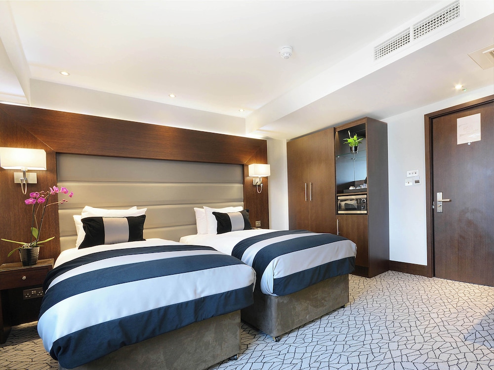 Habitación familiar Deluxe del hotel Park Grand Paddington Court