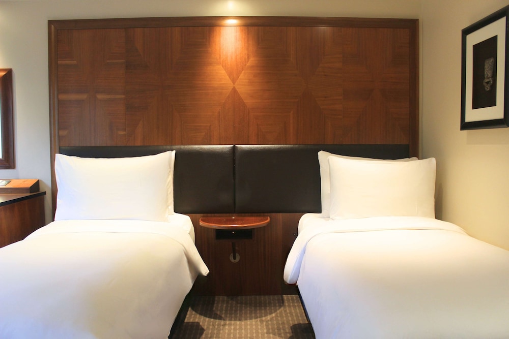 Habitación estándar con 2 camas individuales del hotel Radisson Blu , London Tottenham Court Road (formely Kenilworth). Foto 1