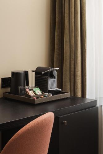 Habitación Executive Junior recién reformada del hotel Central Park. Foto 1