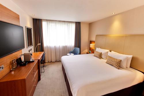 Habitación Deluxe con vistas al jardín - 1 cama extragrande del hotel Thistle London Hyde Park Kensington Gardens