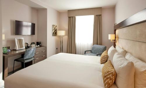 Habitación Deluxe con cama extragrande del hotel Thistle Holborn