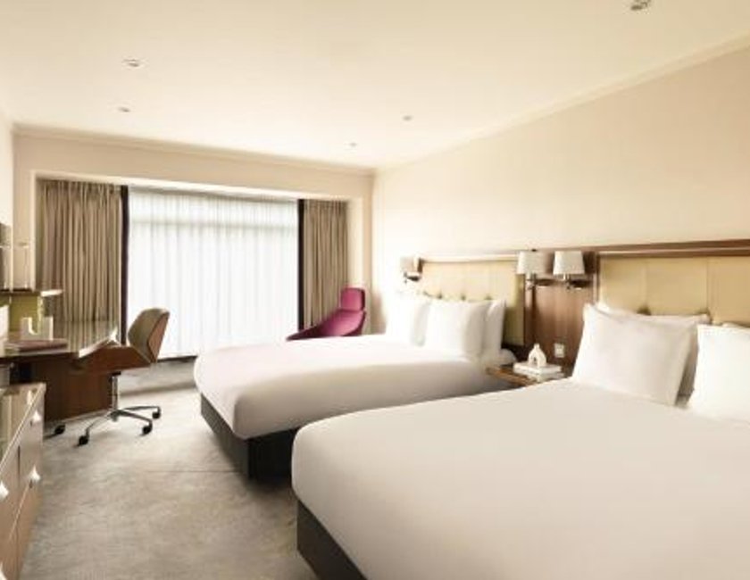 Habitación Familiar comunicada con 4 camas grandes del hotel Hilton London Metropole