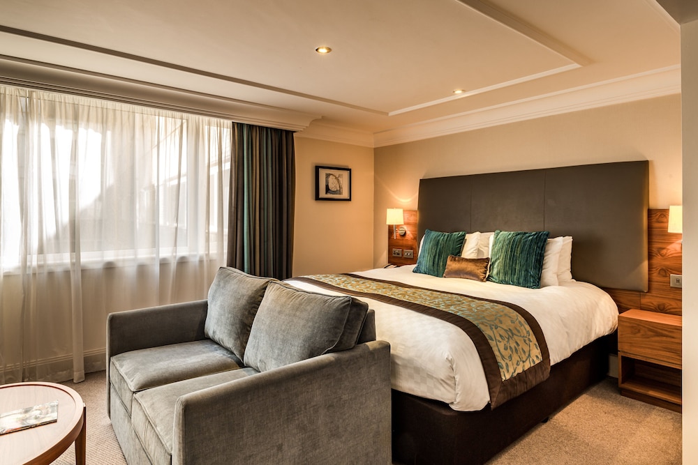 Habitación ejecutiva, 1 cama de matrimonio grande con sofá cama del hotel Thistle London Marble Arch. Foto 5
