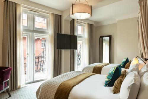 Habitación Familiar Premium - 2 camas dobles del hotel Kimpton Fitzroy London, An Ihg. Foto 1